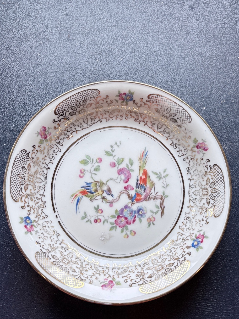 Ivory Porcelain Decorative Dinner Plate with Colorful Bird Motif and Gold Trim